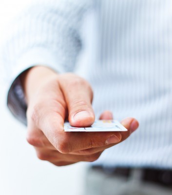 Male hand showing credit card